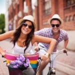 Happy expats cycling abroad