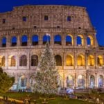 giant christmas tree in front of the colosseum in rome