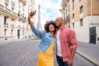 expat couple sightseeing in paris