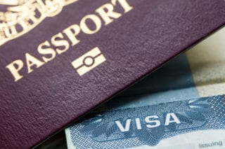 What is the difference between a passport and a visa?