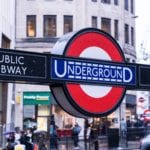 public transit: A blue and red Underground sign in London
