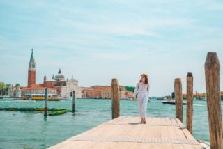 expat walking on a doc in venice