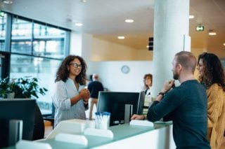 expats collecting paperwork to become citizens in the uk