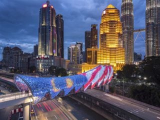 The Saloma Link bridge with the Malaysian flag in Kuala Lumpur