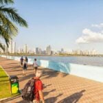 Tourists walking along the waterfront in Panama City, where many foreigners wonder, is Panama safe?